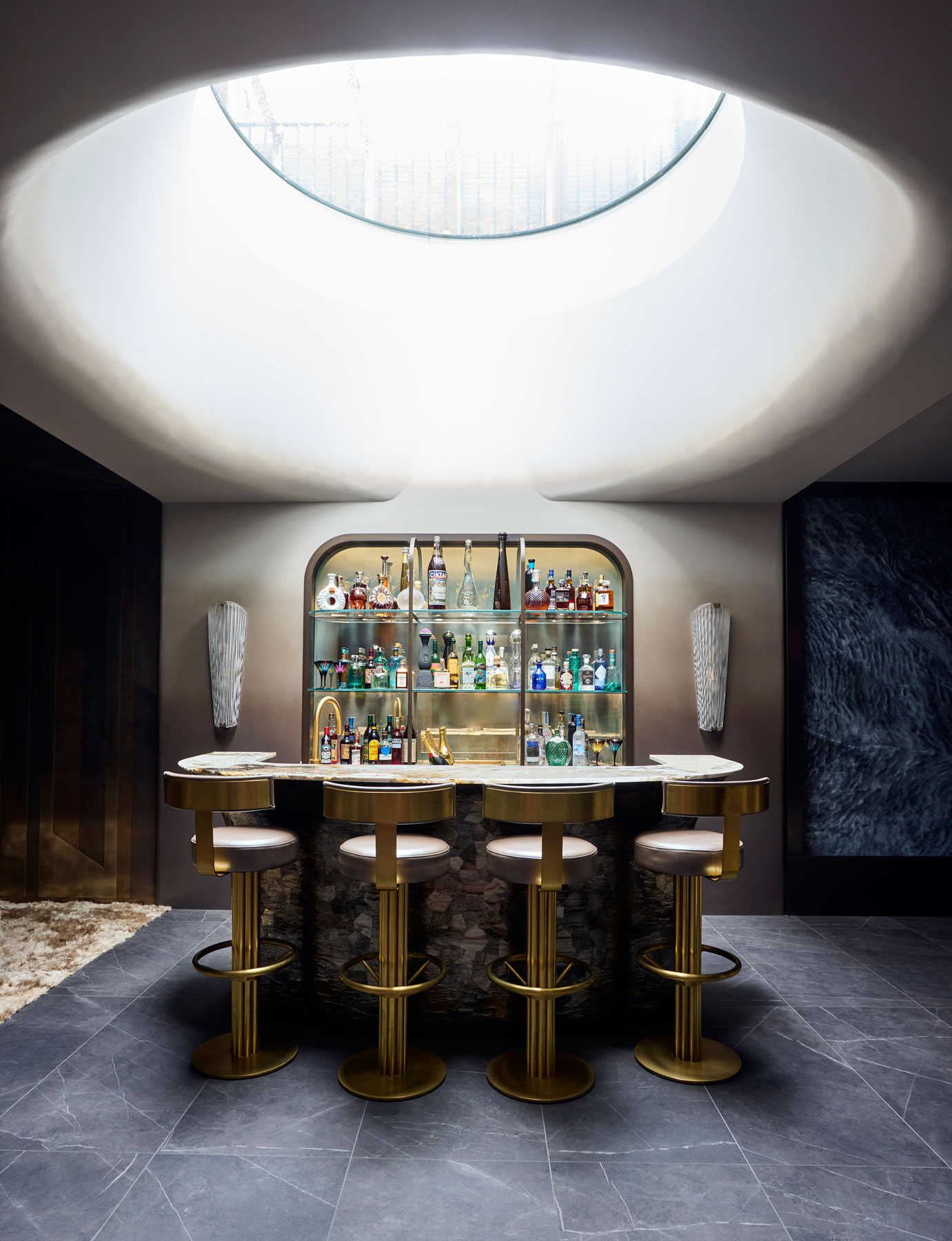 Bar with dramatic oculus ceiling - Trilbey Gordon Interiors