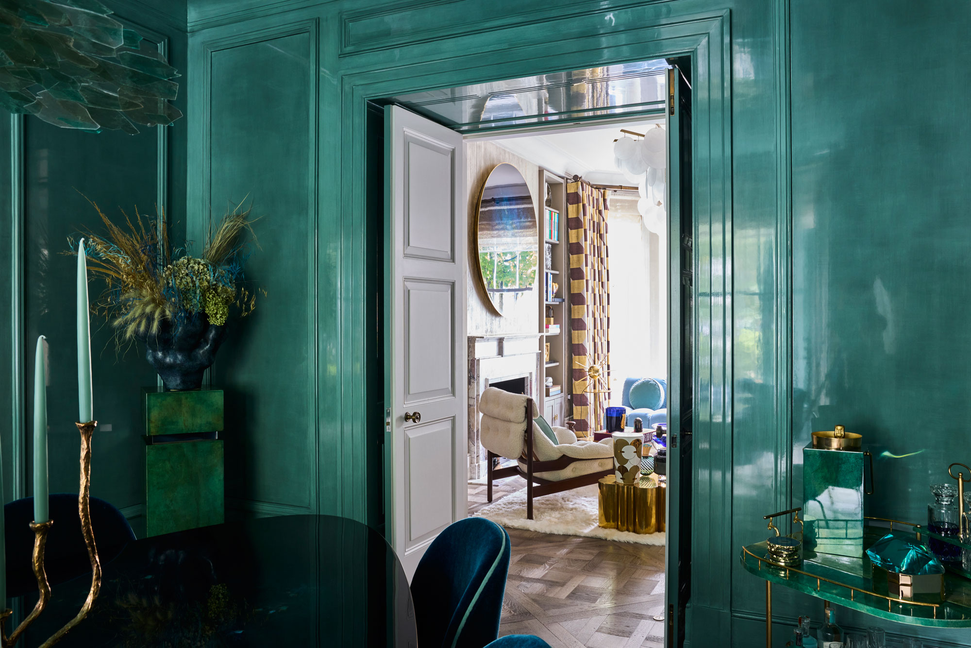 View from lacquered dining room through to living room